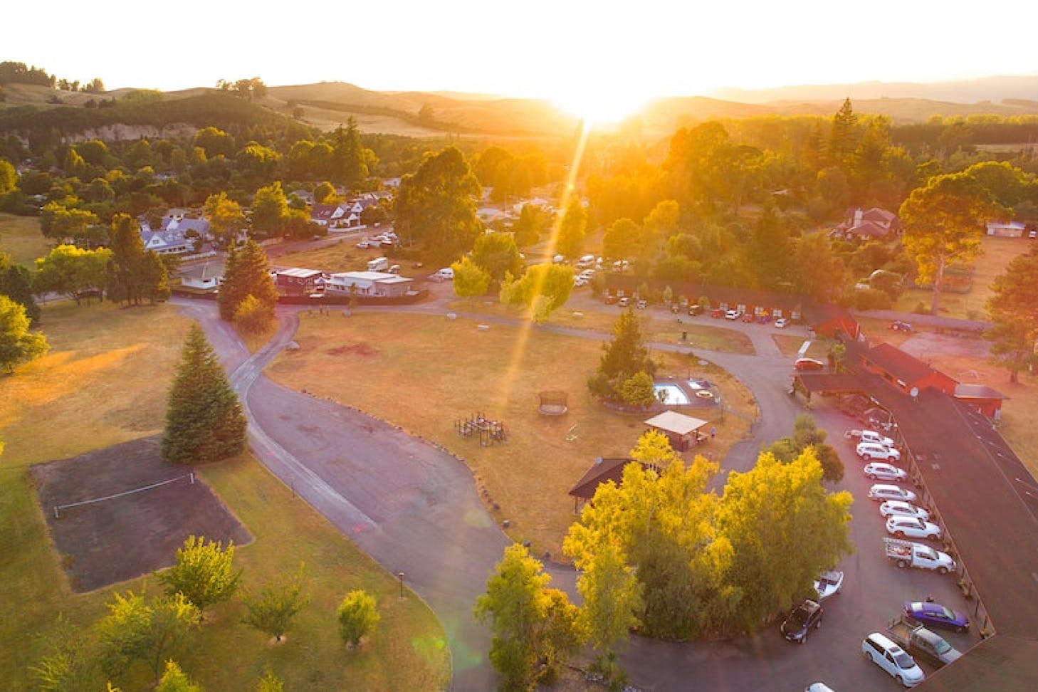 The sun rising over Parklands Motor Lodge, one of the best camping spots in Taupo.